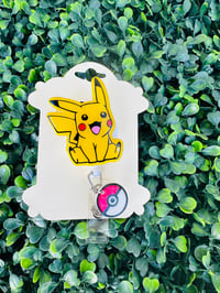 Image 1 of Pokémon badge reel