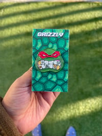 Image 1 of ninja turtle pin