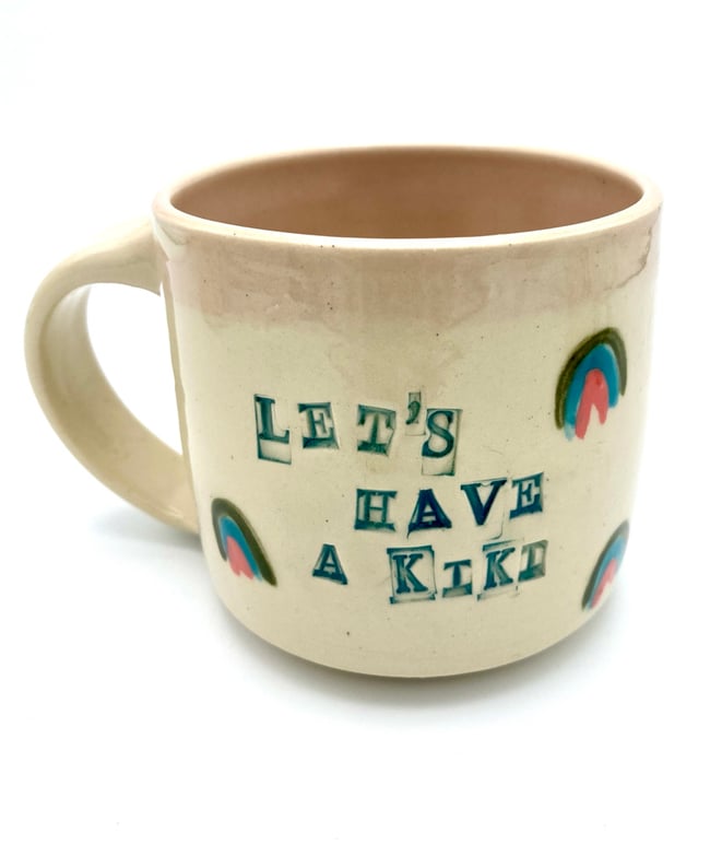 Let’s Have a Kiki Mugs