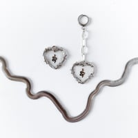 Image 1 of 'Serpent's Heart' // Huggie Earrings