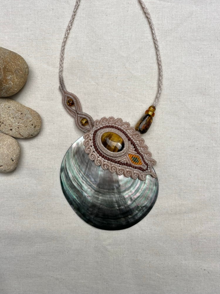 Image of macrame necklace with tigers eye and mother of pearl shell 