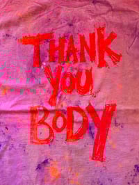 Image 1 of Pink and purple tie dye T shirt with pink and orange bright text (5XL)