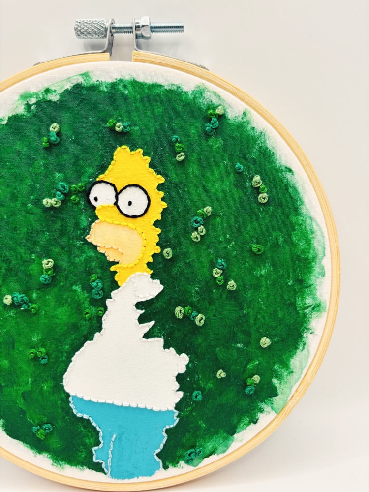Image of Homer in a hedge