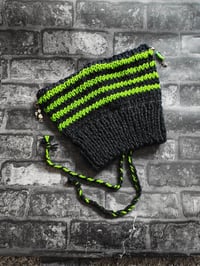 Image 3 of Ed's hats and charms