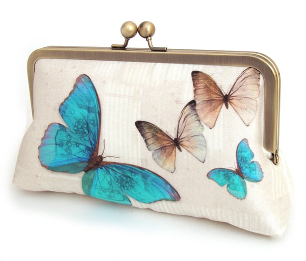 Image of Blue butterflies, printed fabric clutch bag with optional chain handle