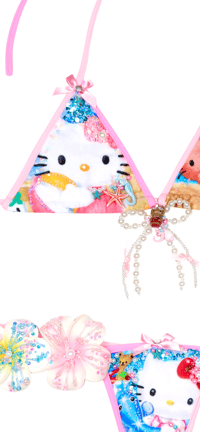 Image 6 of tanned hellokitty in the beach ball game