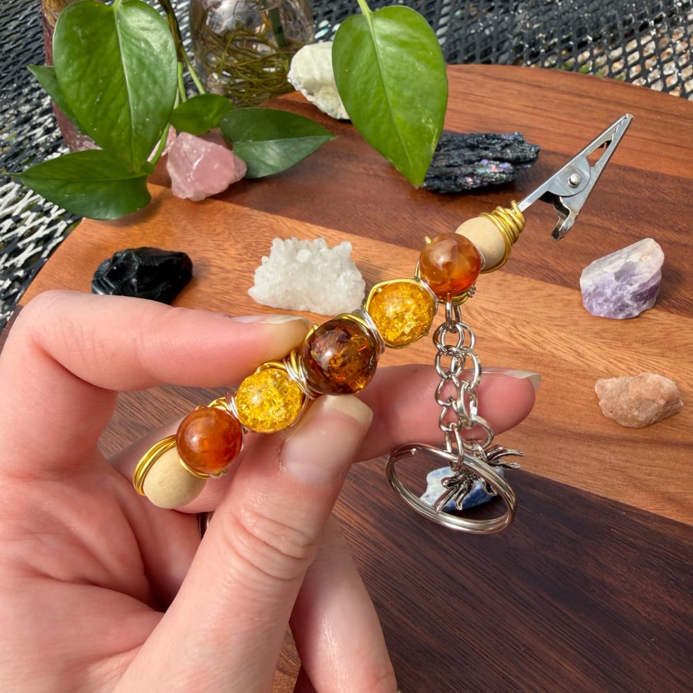 Image of sun ray clip keychain