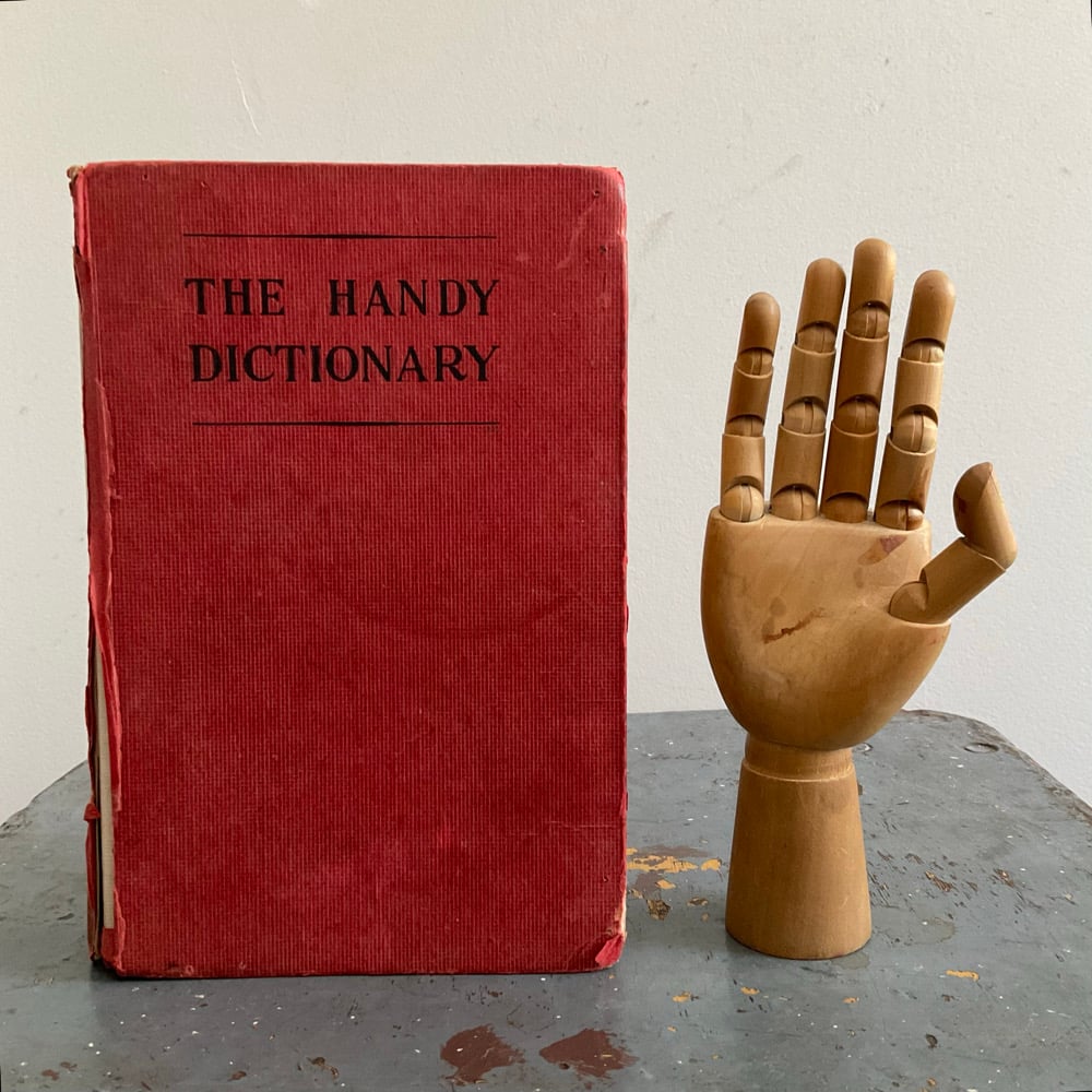 Image of Small Articulated Hand & Dictionary 