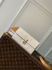 Image 5 of Lou long wallets (click to browse)