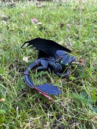 Image 1 of Laying Night Dragon Sculpture 