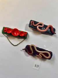 Image 1 of Hair items (coils, clips, barrette)