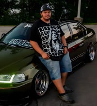 Image 1 of The 7 Tee