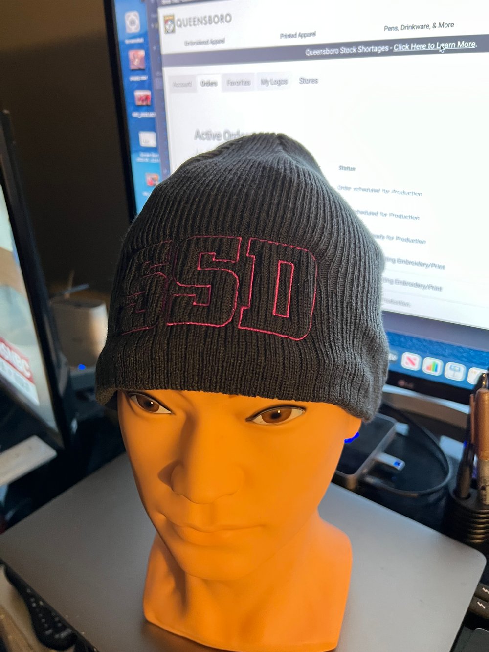 Slate Grey New Era Knit beanie hat with embroidered Magenta SSD Outline Logo