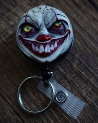 Image 8 of Handmade Pennywise Badge Reel Keychain 