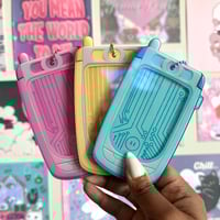 Image 1 of nova 710 flip phone pc holders. 