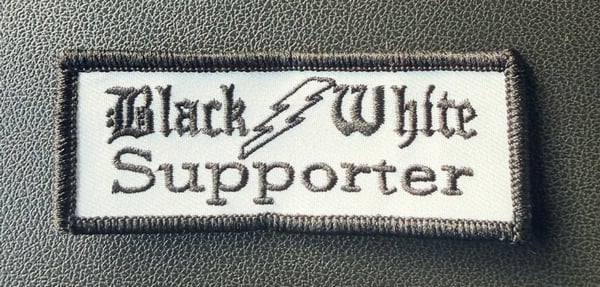 Image of Black and White Support 