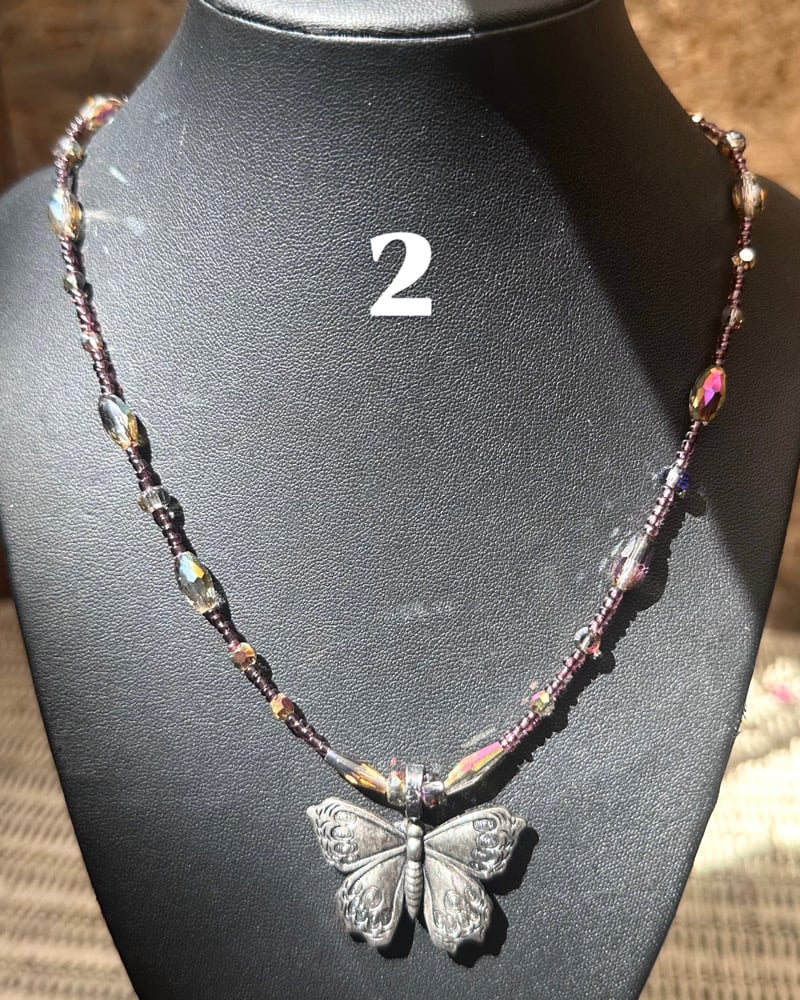 Image of aura butterfly necklaces
