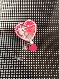 Image 3 of chocolate box badge reel 