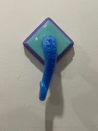 Image 1 of Blue Glass Tentacle on tea and lilac square base