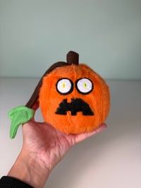 Image 5 of Weighted Minky Jack-o’-Lanterns