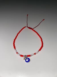 Image 1 of Blue evil eye Red/White bracelet 