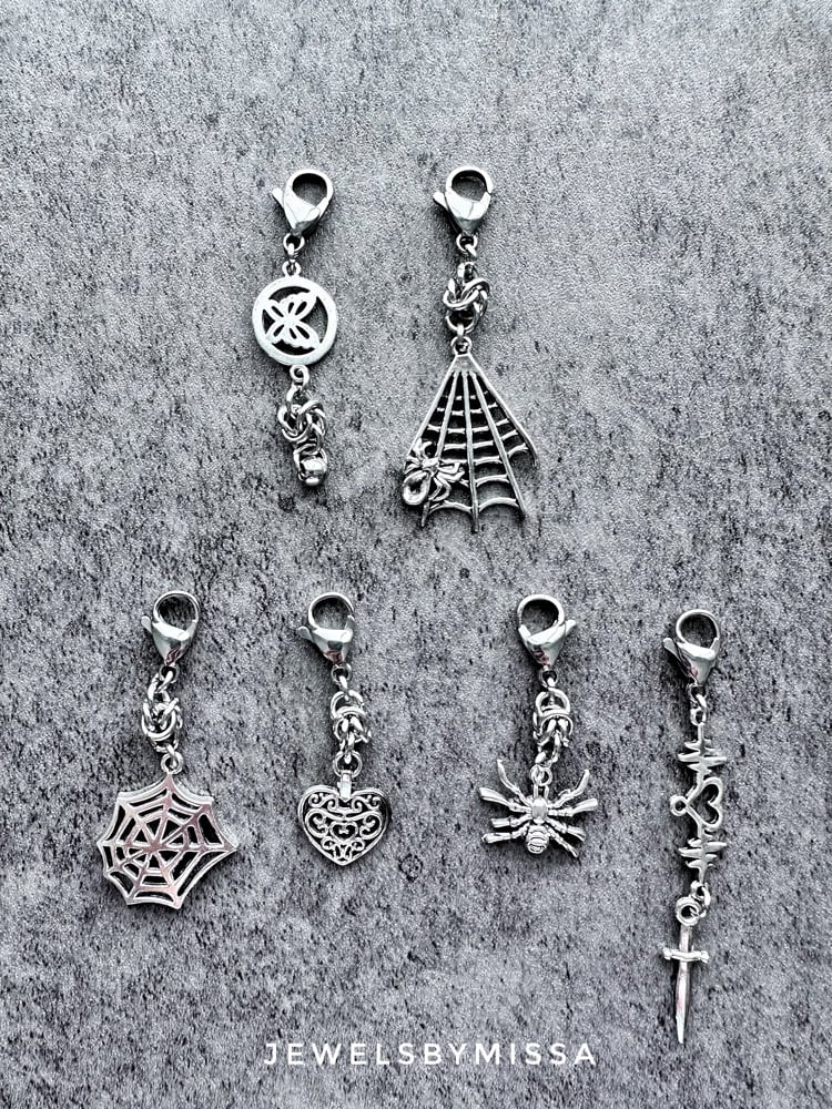 Image of Whisper Zipper-Pulls