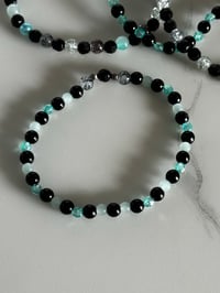 Image 5 of Midnight Glitz Black and Teal Tumbler Bracelet Stack