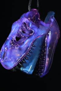 Image 1 of Opalized royal jelly T-rex skull pendant with stardust tip 🦖😤
