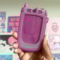 Image 2 of nova 710 flip phone pc holders. 