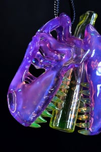 Image 3 of Chunky opal royal jelly Trex skull pendant with uv teeth & joint tip