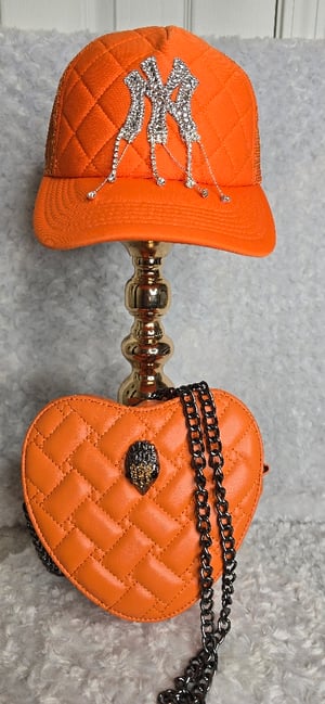 Image of Orange KG bag w/NY hat