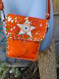 Image 6 of Woodstock cross body passport bag - orange with gold and peach star
