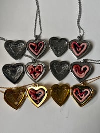 Image 1 of Worm Lockets
