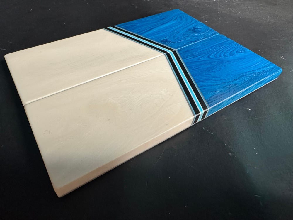 Image of Teal Juma Gem Resin & Elforyn Super Tusk Segmented Knife Scales