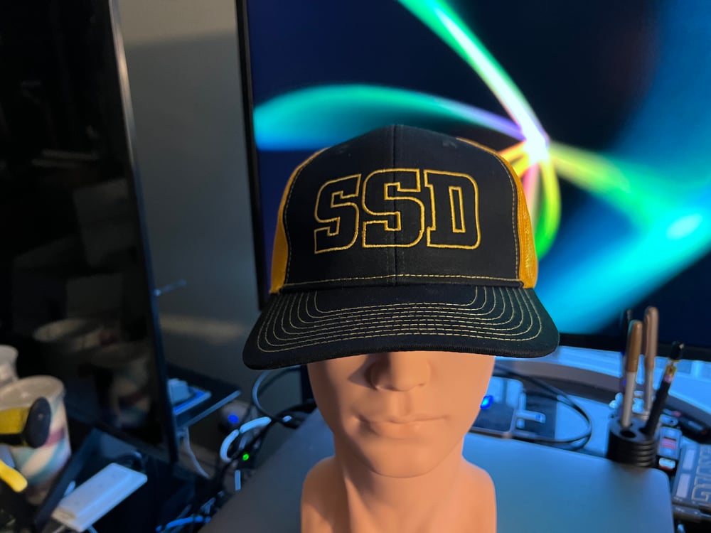 Gold SSD Outline Logo Black and Gold Trucker Snapback Cap