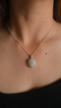 Image 1 of Fossilised Coral Pendat