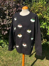 Image 1 of Upcycled Black Sweater With Handpaind Eye Patches