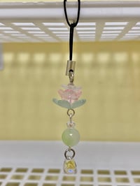 Image 3 of lotus phonecharm