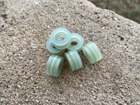 Image 1 of double jade stubby beads glow center 