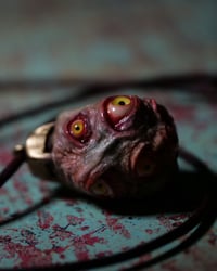 Image 13 of Egg of the King pendant, leather cord, brass hardware, all seeing glowing eyes