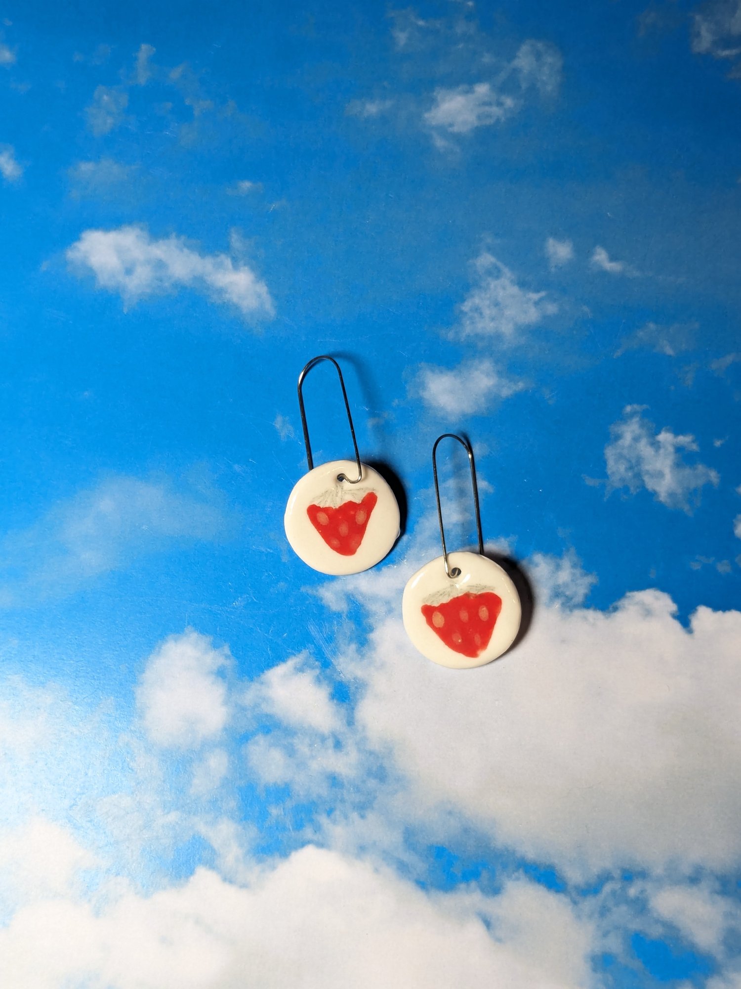 Image of round strawberry earrings