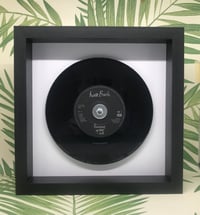 Image 1 of Kate Bush, framed original 7" vinyl records