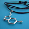 serotonin dangling necklace