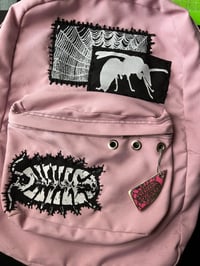 Image 2 of Pink patch backpack with recycled skateboard keychain 