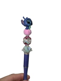 Image 4 of Alien With Doll Pen