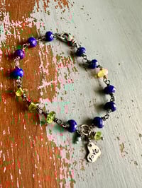 Image 13 of lapis and peridot charm bracelet
