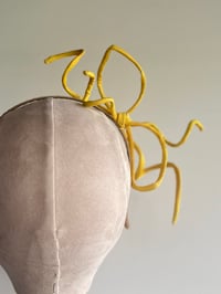 Image 3 of Yellow rouleau bow