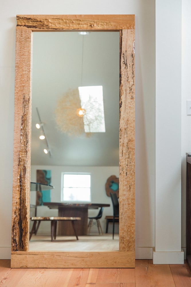 Image of large figured maple mirror