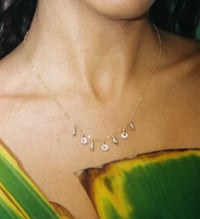 Image 1 of little puka charm necklace 