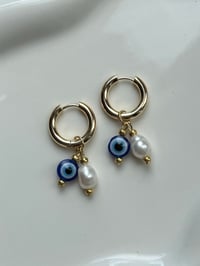 Image 1 of 18k gold Evil Eye Pearl Huggies
